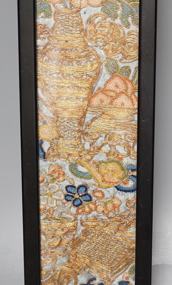 A Chinese framed embroidered floral panel - 53 x 8cm